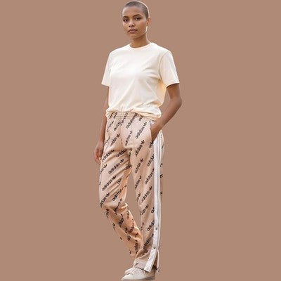 🚺 M US — adidas Originals Adibreak "Logomania" Track Pants [BLUSH PINK] HM4882